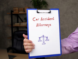 car accident lawyer Melbourne, FL with a man holding a clipboard