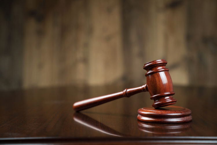 Jury Trials - gavel on legal desk